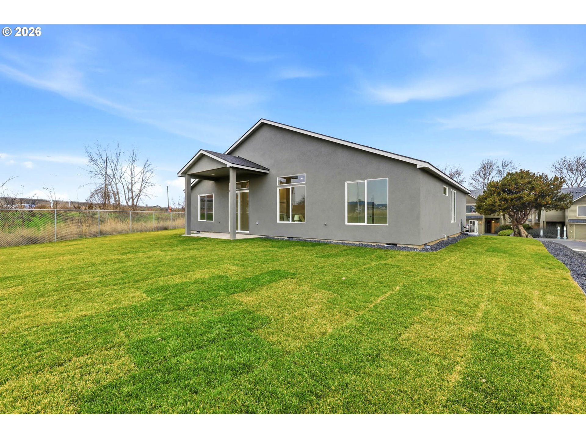 1327 Southeast 9th Street Hermiston, OR 97838 - Photo 23 of 28 a house view with a outdoor space