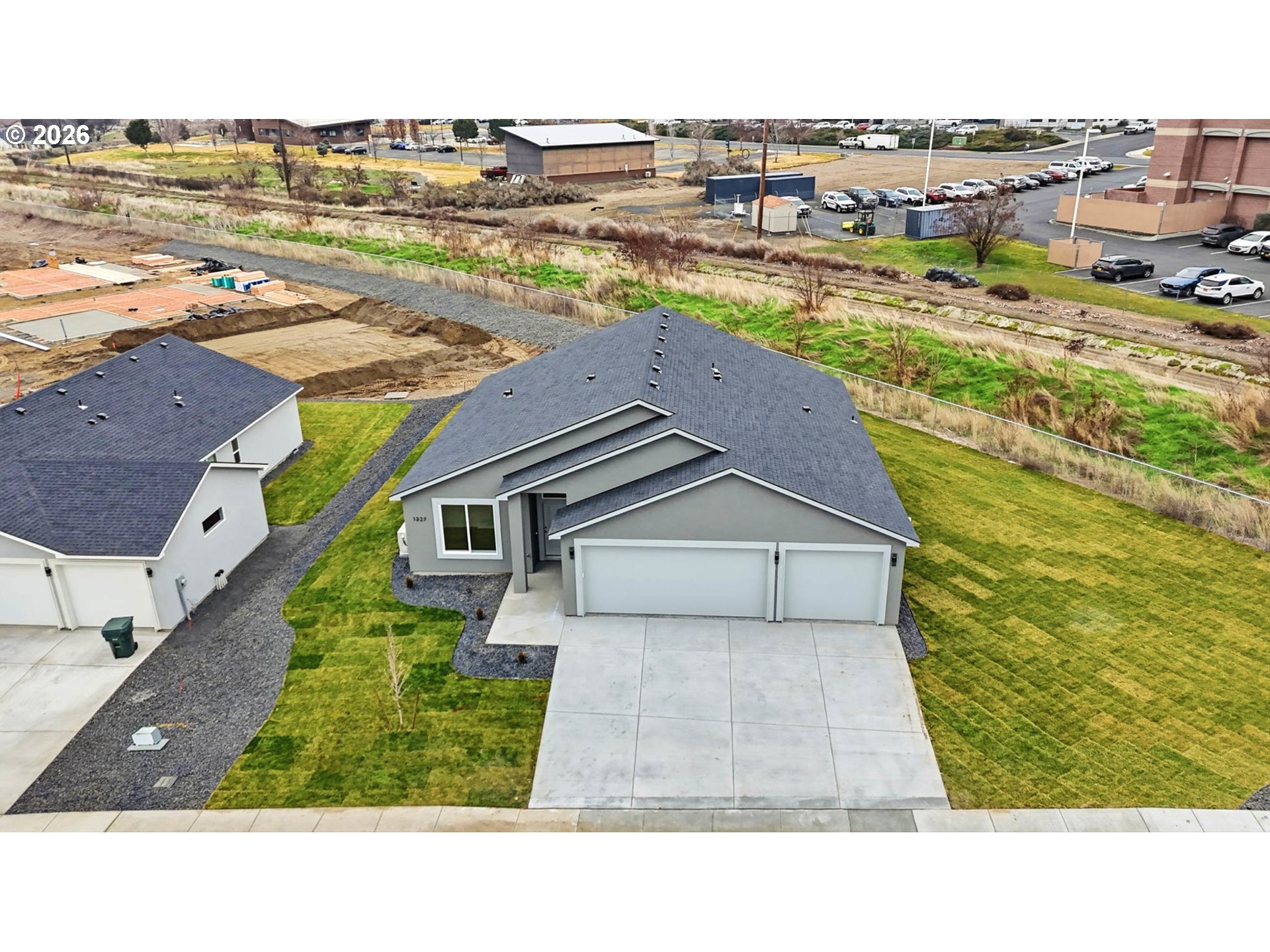 1327 Southeast 9th Street Hermiston, OR 97838 - Photo 25 of 28 a picture of houses with outdoor space and ocean view