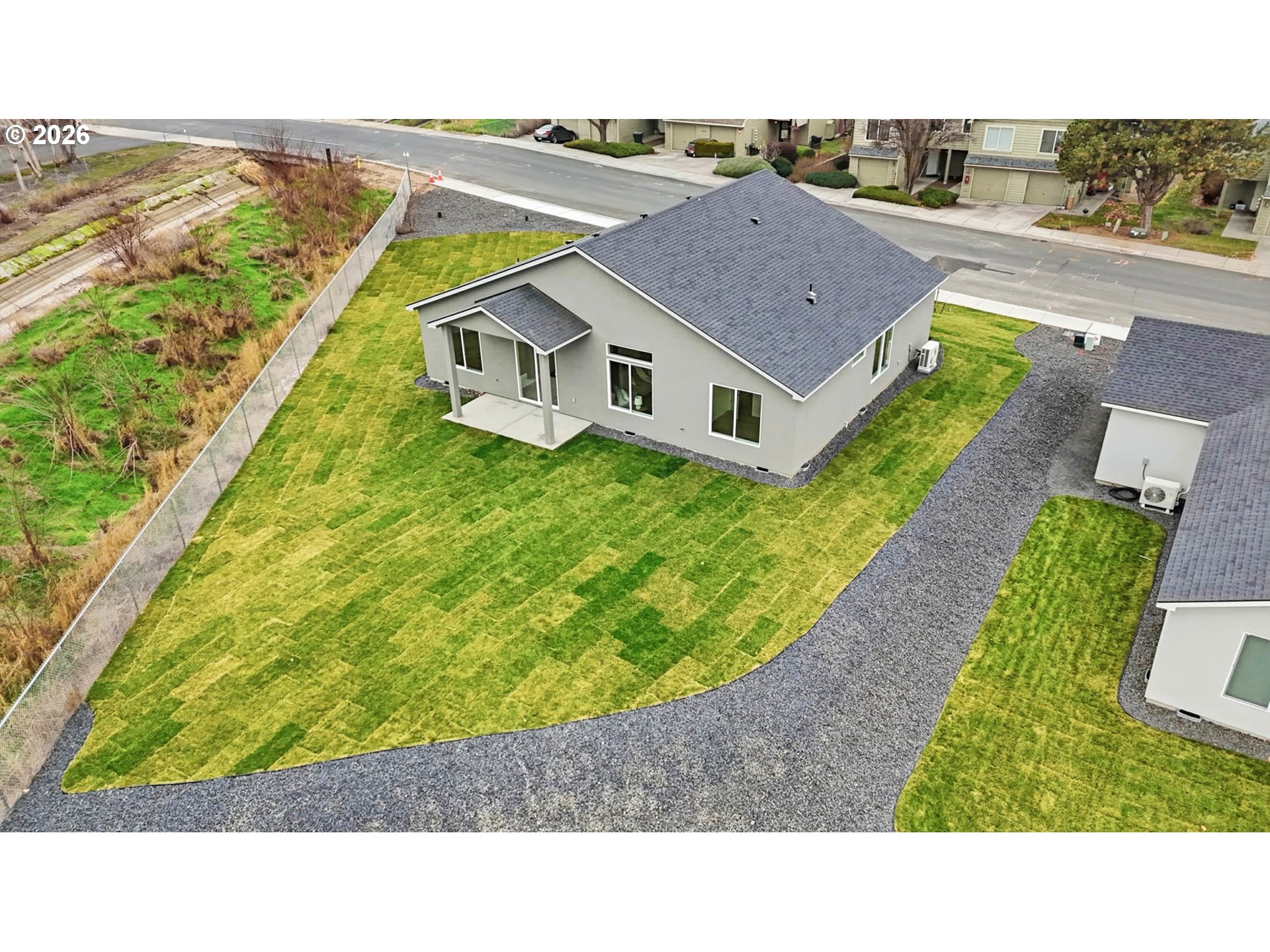 1327 Southeast 9th Street Hermiston, OR 97838 - Photo 26 of 28 a aerial view of a house with a yard