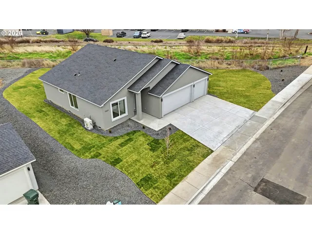 a aerial view of a house with a ocean view