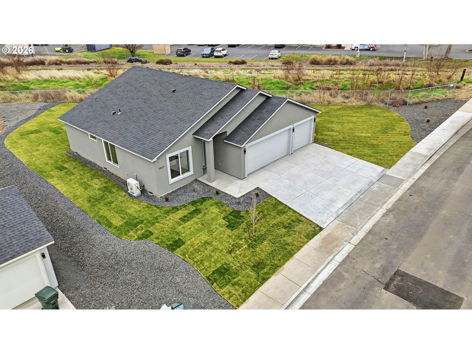 1327 Southeast 9th Street Hermiston, OR 97838 - Photo 28 of 28 a aerial view of a house with a ocean view