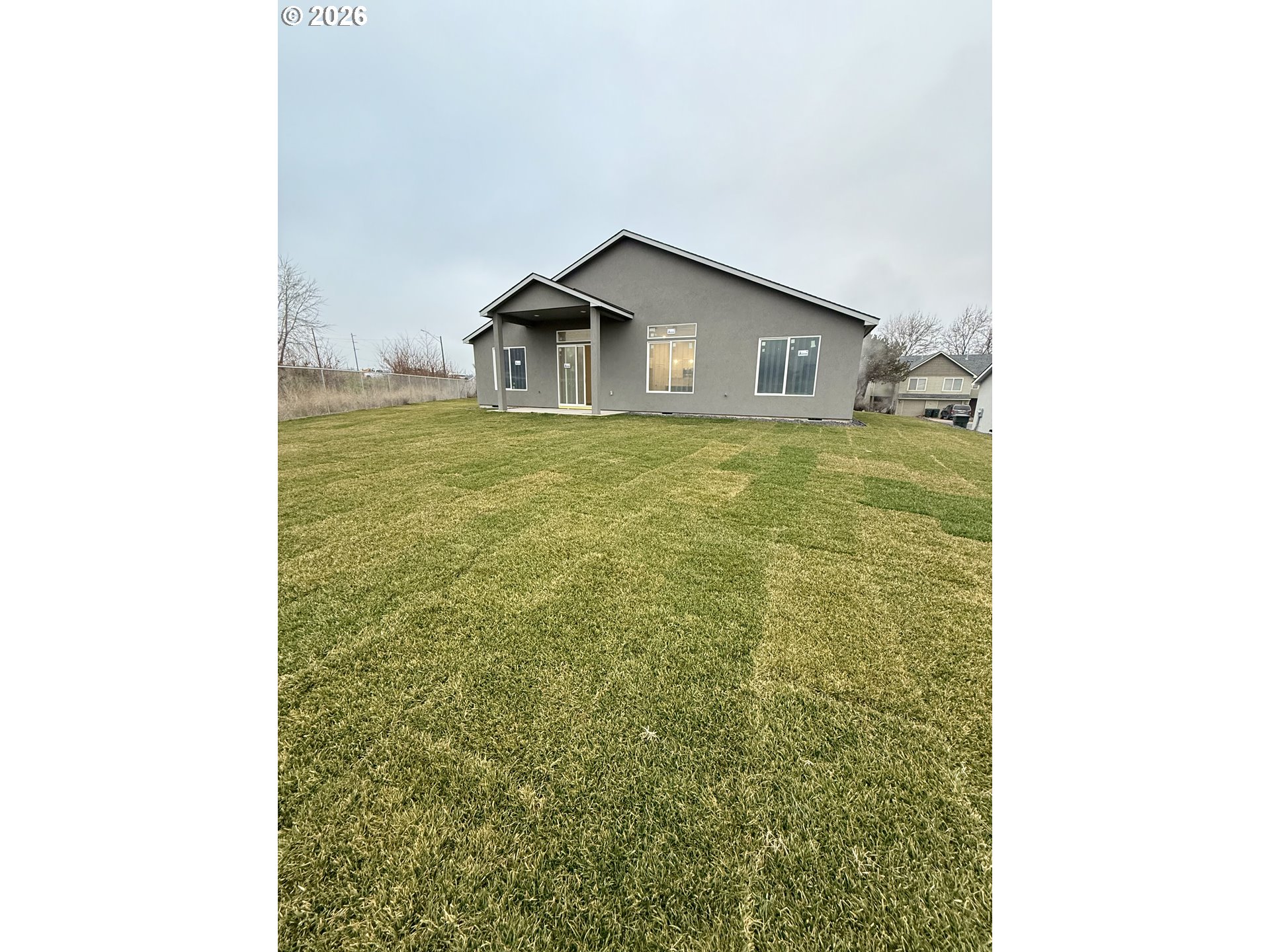 1327 Southeast 9th Street Hermiston, OR 97838 - Photo 5 of 6 a house view with a outdoor space