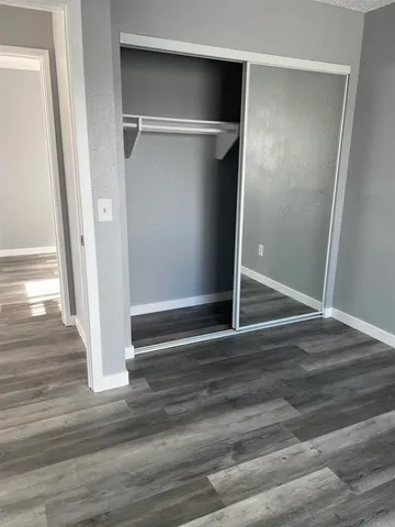 a view of an empty walk in closet