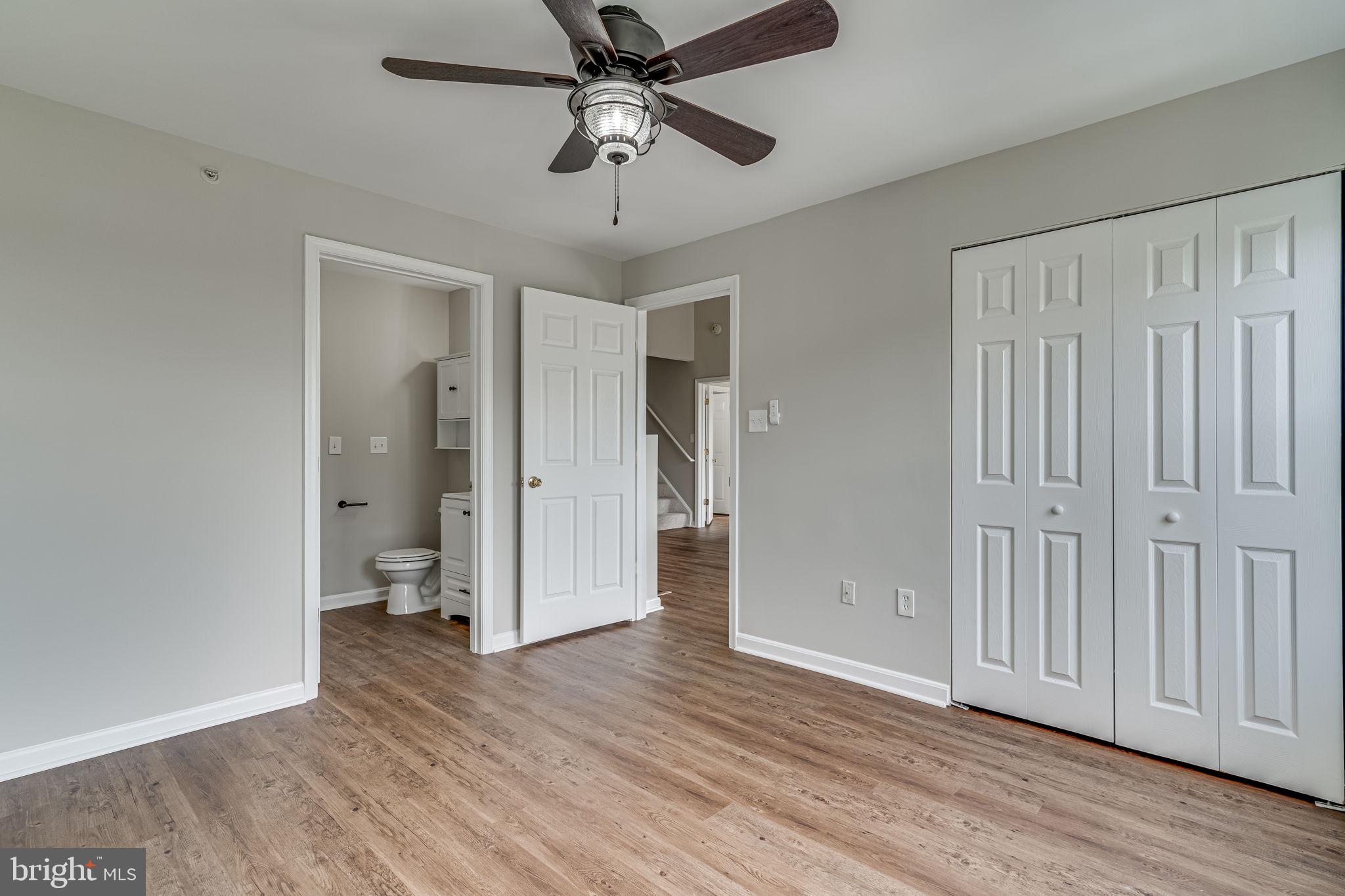 1067 Gardenview Loop, Unit 304 Woodbridge, VA 22191 - Photo 16 of 36 wooden floor in an empty room