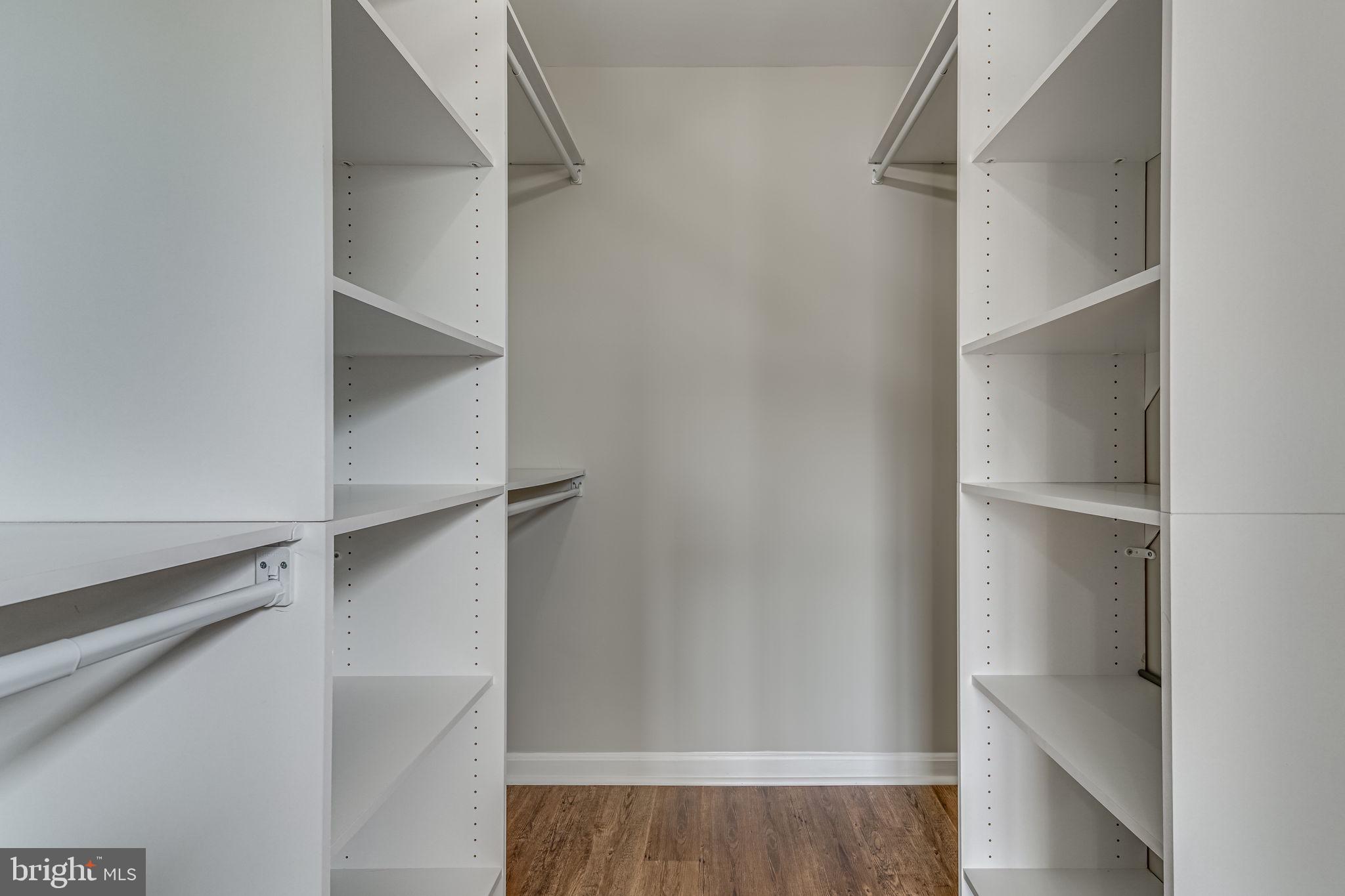 1067 Gardenview Loop, Unit 304 Woodbridge, VA 22191 - Photo 22 of 36 a view of walk in closet with empty racks