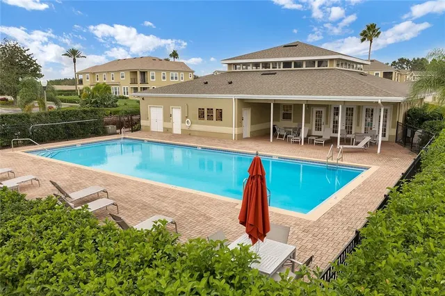 a view of a house with a swimming pool