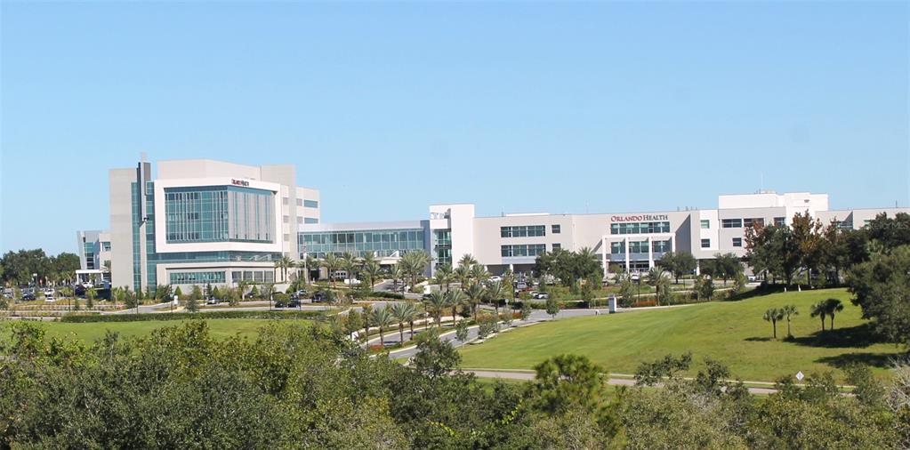 17523 Promenade Drive Clermont, FL 34711 - Photo 44 of 44 a view of a city with tall buildings