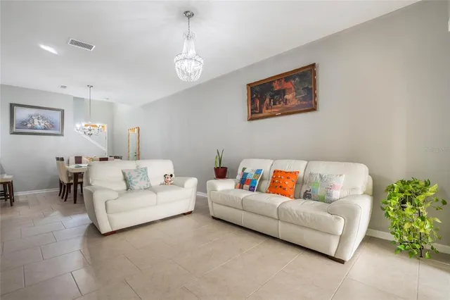 a living room with furniture and a couch
