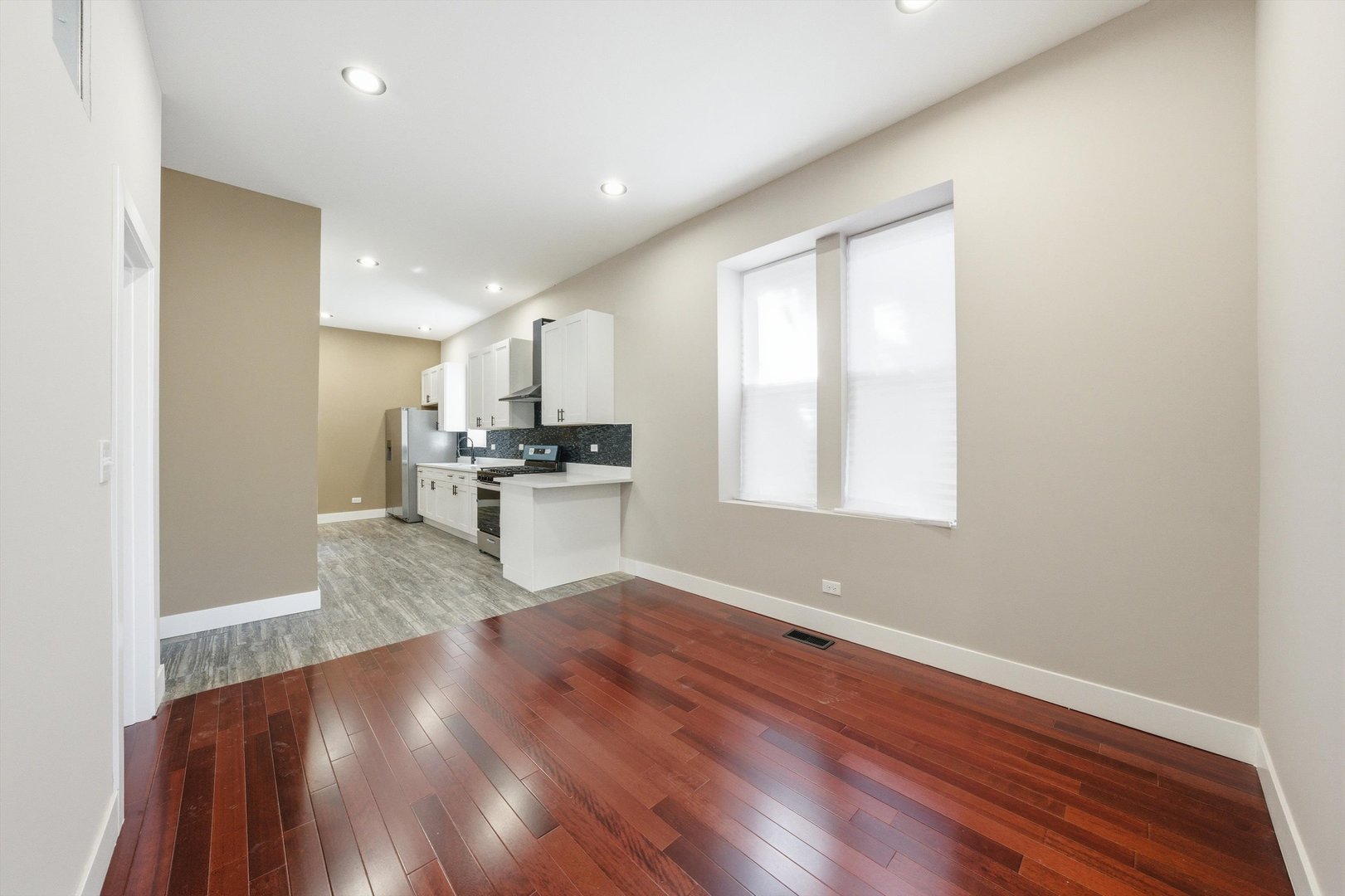 7017 South Normal Boulevard Chicago, IL 60621 - Photo 4 of 23 a view of kitchen with sink and wooden floor