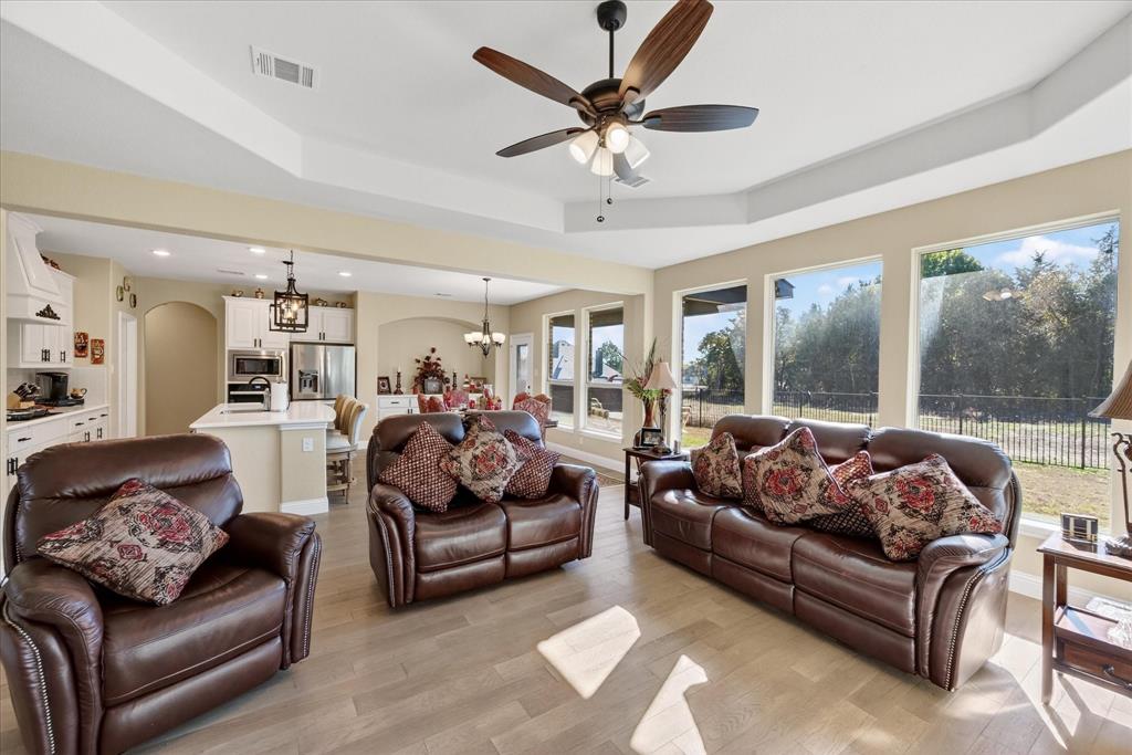 4434 Verbena Street Midlothian, TX 76065 - Photo 12 of 32 a living room with furniture and a large window