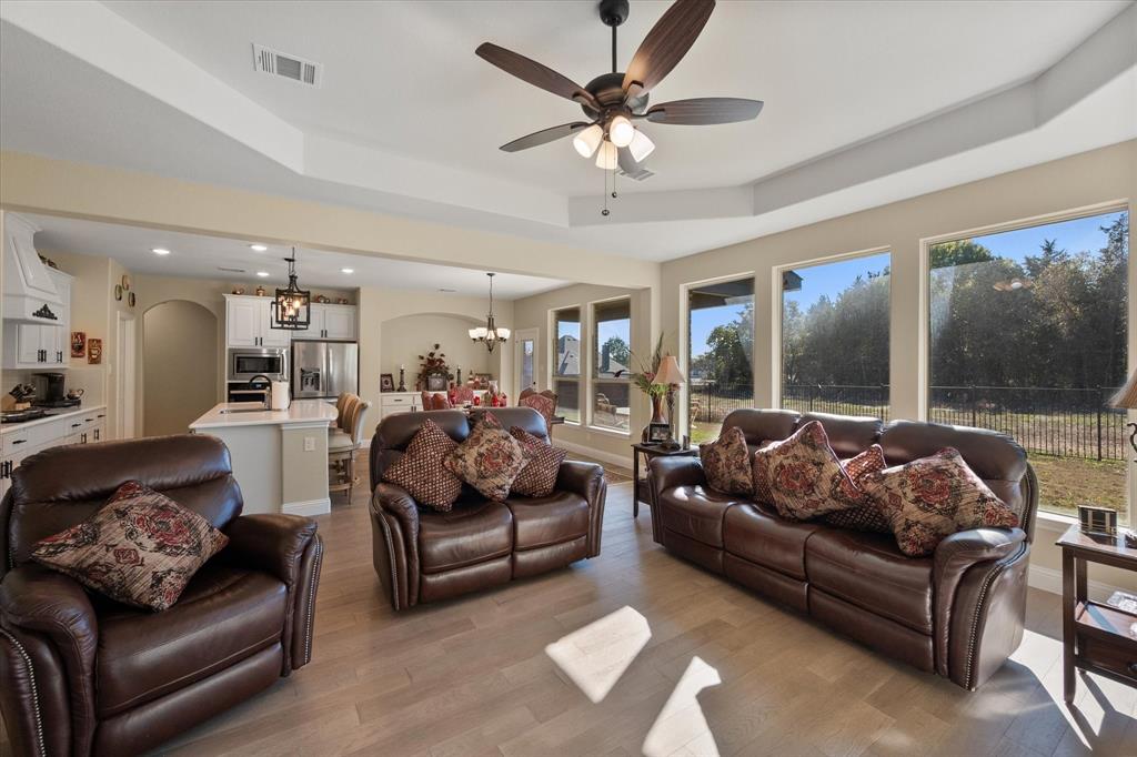 4434 Verbena Street Midlothian, TX 76065 - Photo 14 of 32 a living room with furniture and a large window