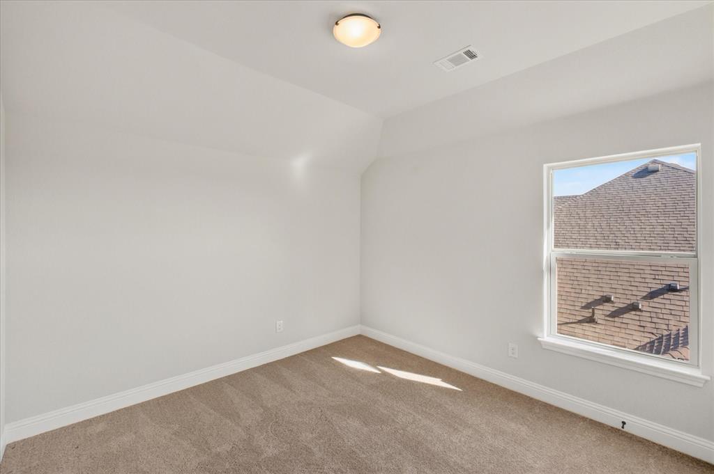 4434 Verbena Street Midlothian, TX 76065 - Photo 27 of 32 a view of an empty room with a window