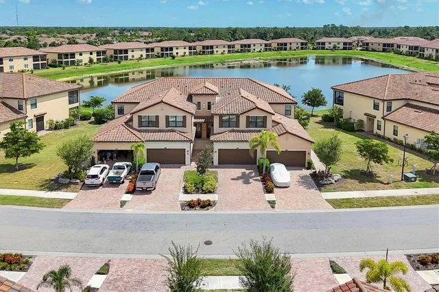an aerial view of a house with a swimming pool