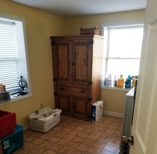 1248 Rutledge Ford Road Decherd, TN 37324 - Photo 12 of 13 a room with a mirror and furniture