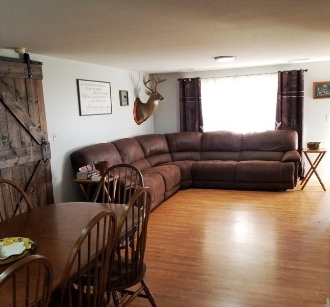 1248 Rutledge Ford Road Decherd, TN 37324 - Photo 3 of 13 a living room with furniture and wooden floor