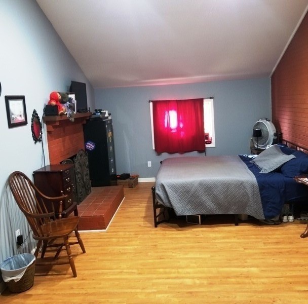 1248 Rutledge Ford Road Decherd, TN 37324 - Photo 6 of 13 a bedroom with a bed and chair