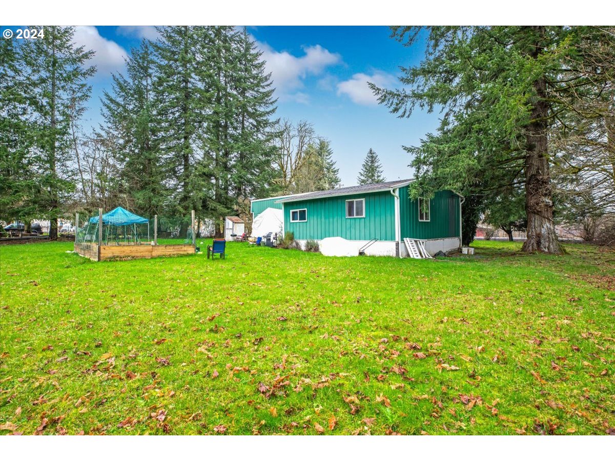 29700 Joe Day Way Grand Ronde, OR 97347 - Photo 14 of 18 a view of house with backyard