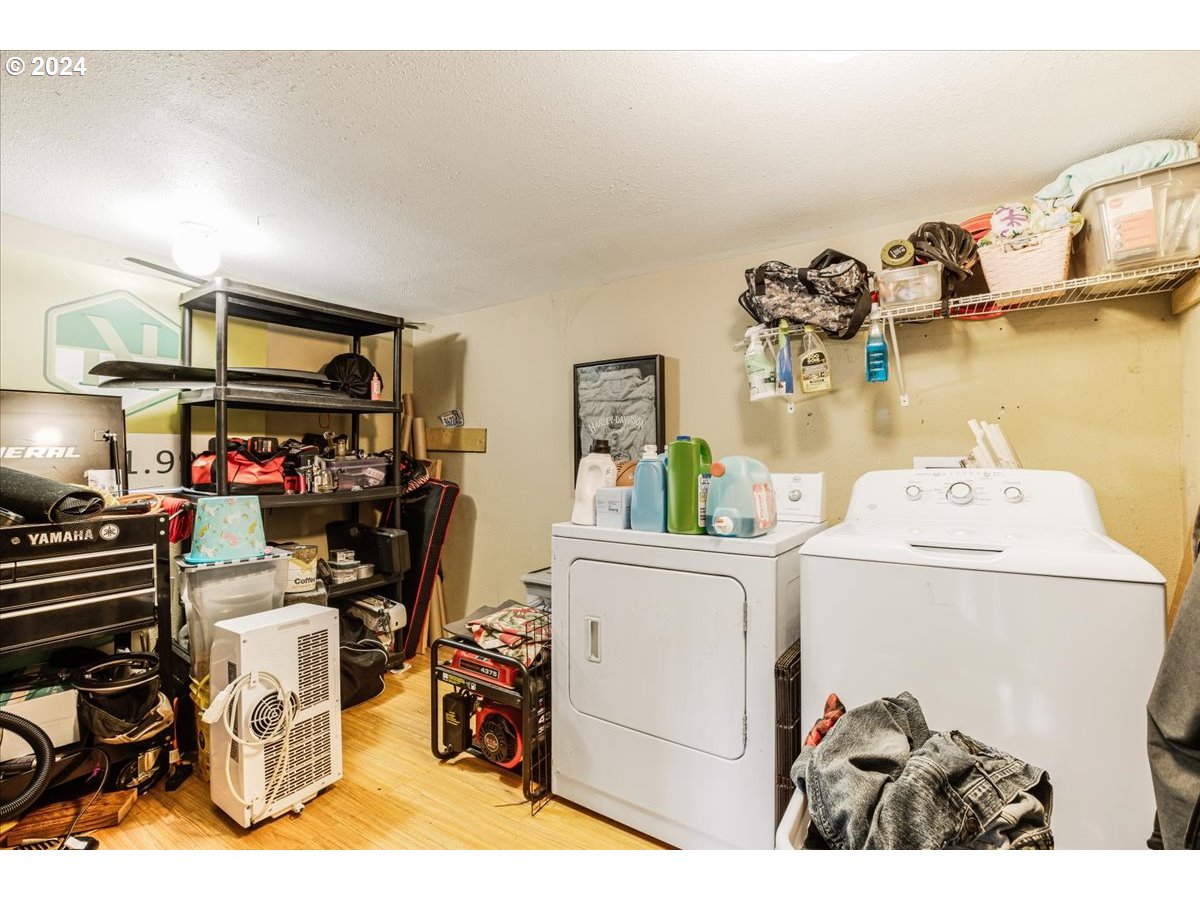 29700 Joe Day Way Grand Ronde, OR 97347 - Photo 10 of 18 a storage room with washer and dryer
