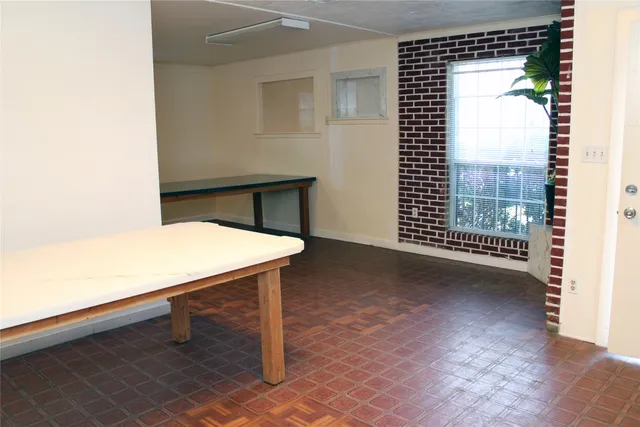 a view of a room that has a window