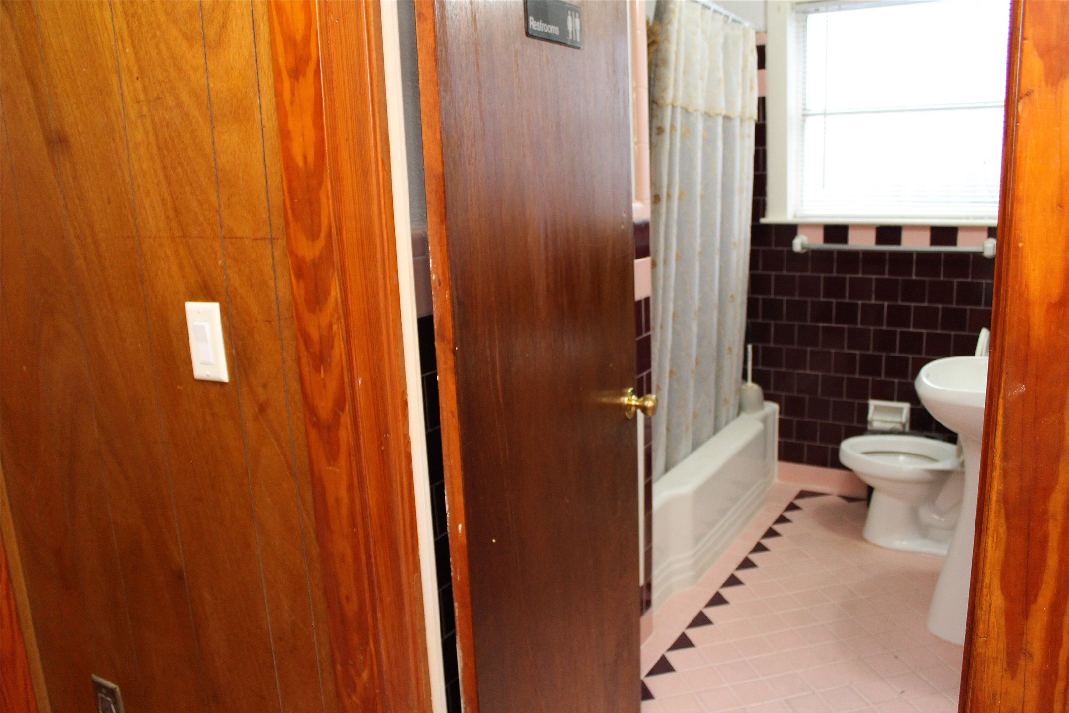 6319 Milwee Street Houston, TX 77092 - Photo 6 of 12 a bathroom with a toilet and shower