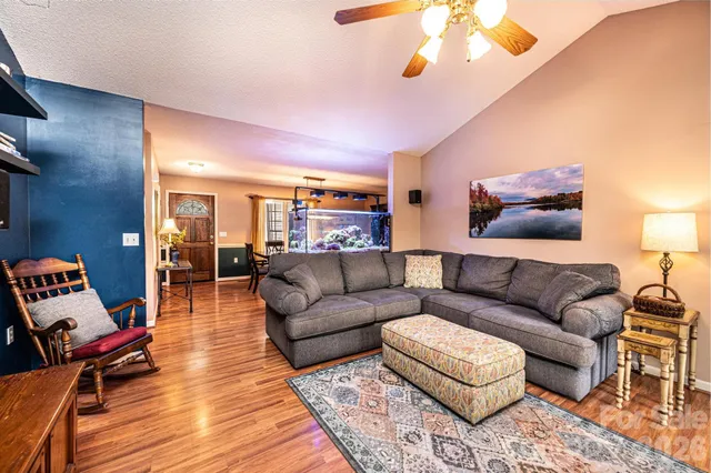a kitchen with a stove a refrigerator and a sink