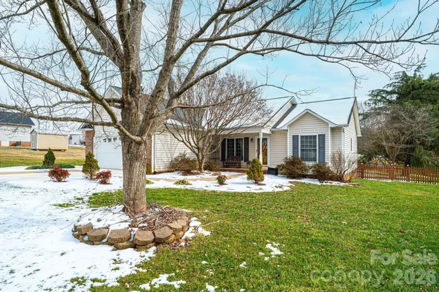 a front view of the house with garden