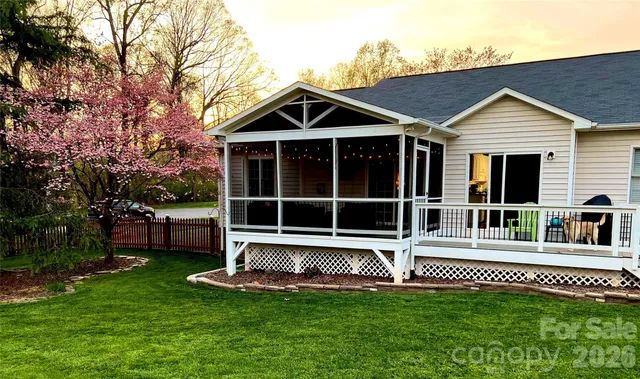 a view of a chairs and table in the patio