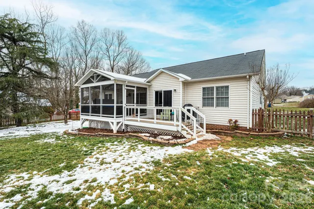 a house view with a sitting space and garden space