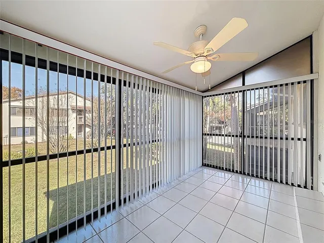an aerial view of a house with a swimming pool
