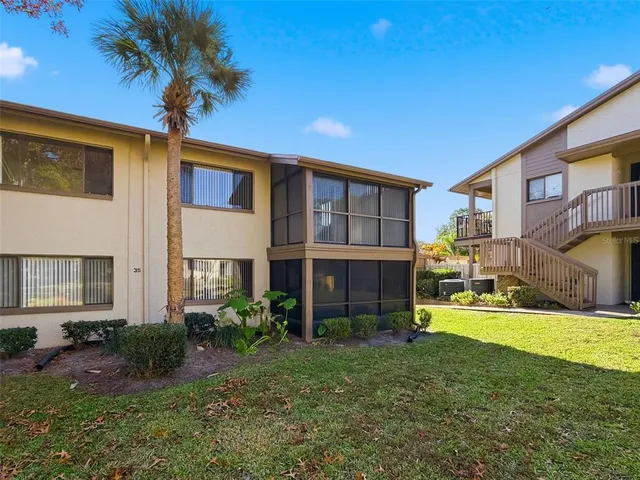 an aerial view of residential building with parking space
