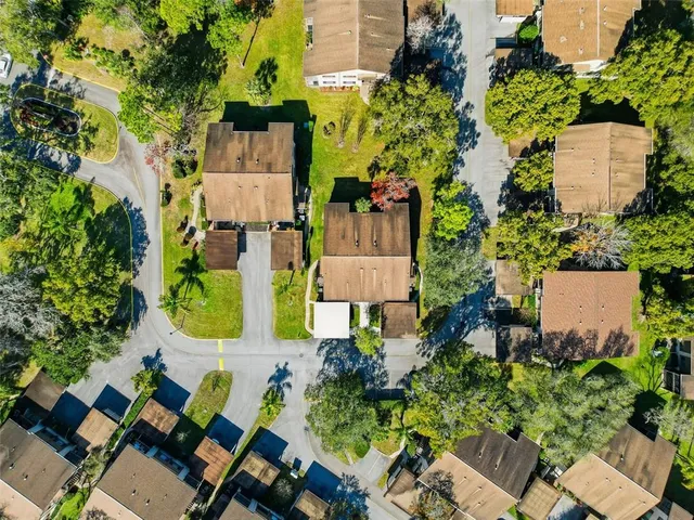 a view of a car park in front of house