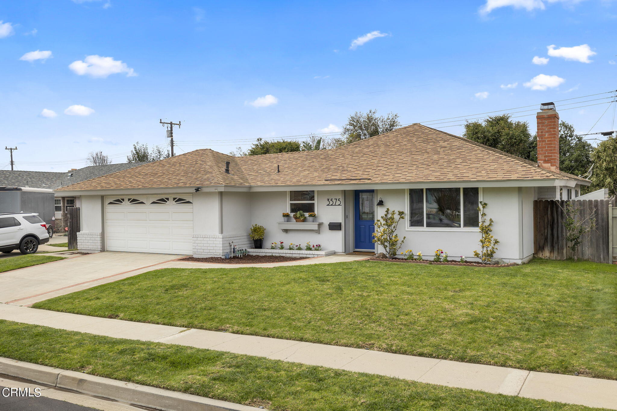 3575 Corby Avenue Camarillo, CA 93010 - Photo 3 of 36 a view of a house with a yard and sitting area