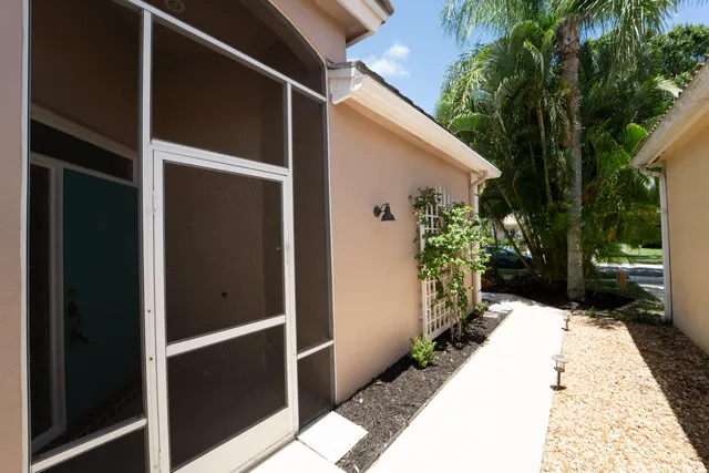 an aerial view of a house with a garden