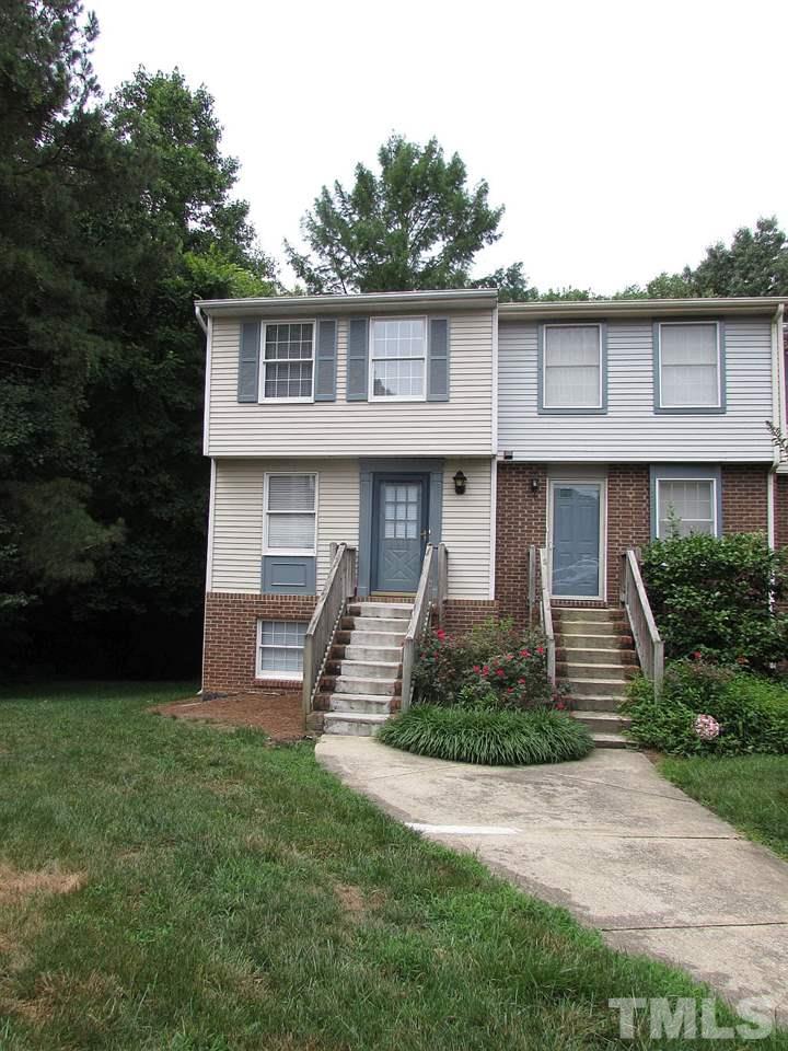 7711 Kelley Court Raleigh, NC 27615 - Photo 1 of 11 a front view of a house with garden