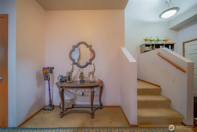 a room with furniture and wooden floor