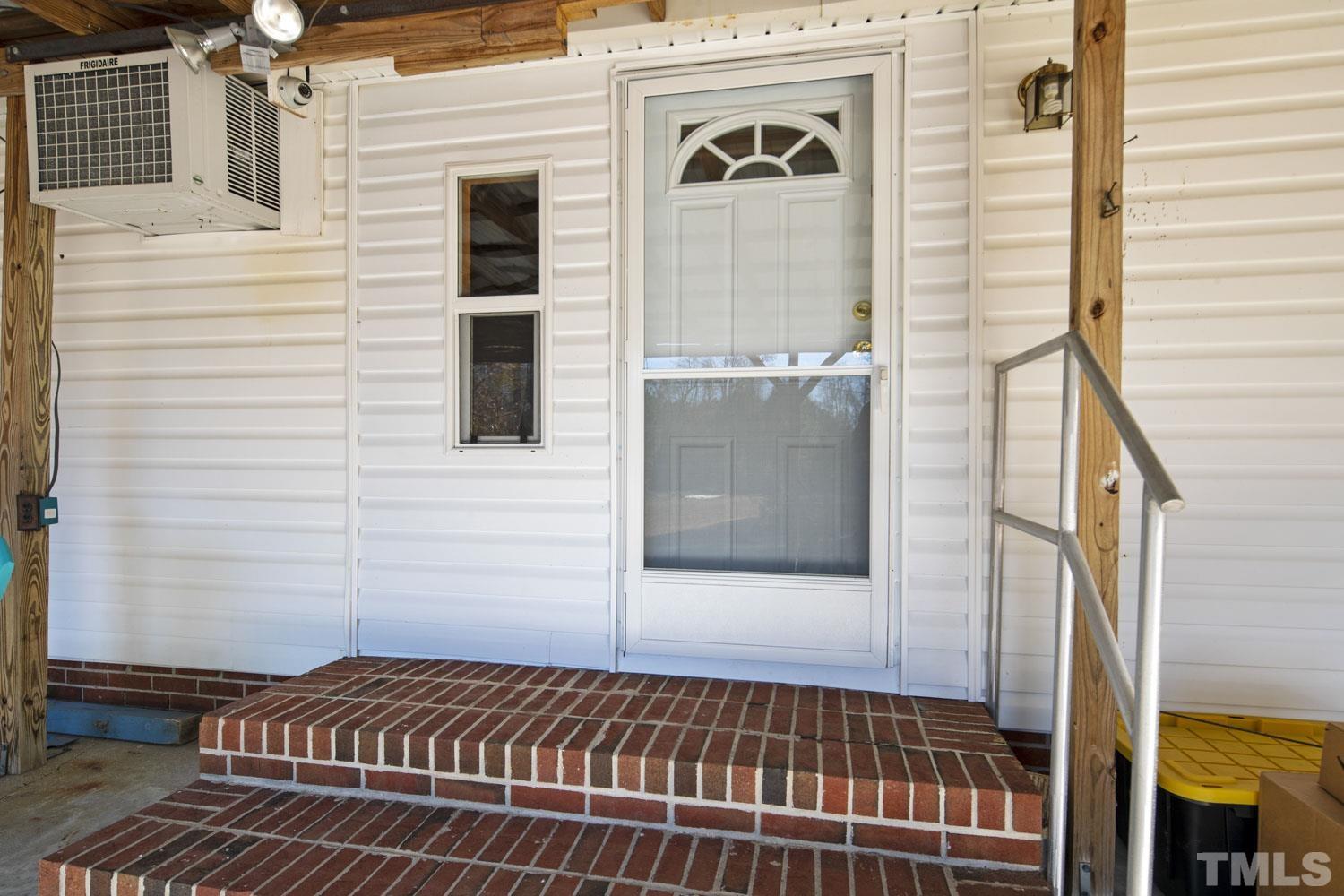 768 Wise Road Dunn, NC 28334 - Photo 22 of 28 a view of a balcony with a door