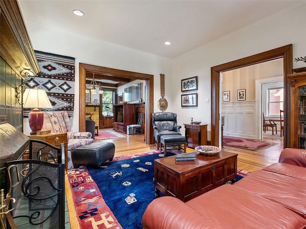 6417 Darlington Road Pittsburgh, PA 15217 - Photo 12 of 40 a living room with furniture and a flat screen tv