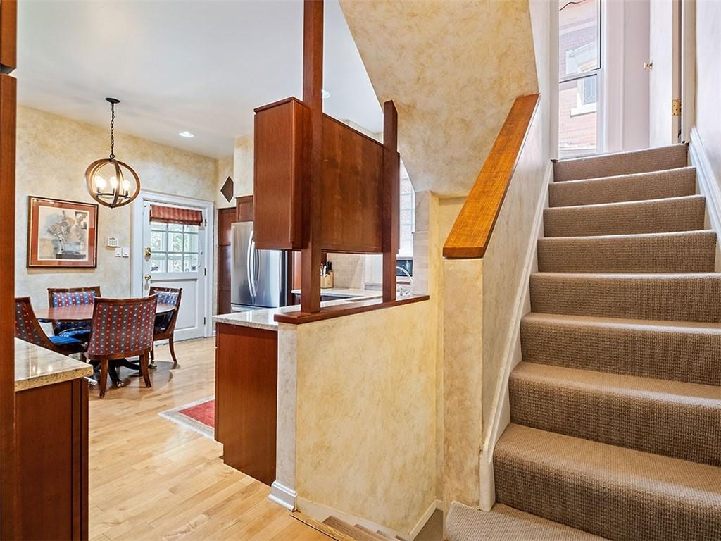 6417 Darlington Road Pittsburgh, PA 15217 - Photo 20 of 40 a view of living room filled with furniture and wooden floor