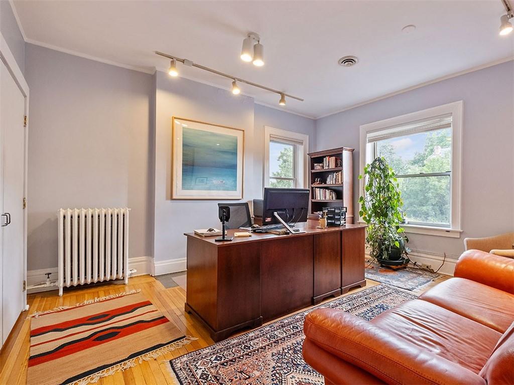 6417 Darlington Road Pittsburgh, PA 15217 - Photo 29 of 40 a living room with furniture and a window
