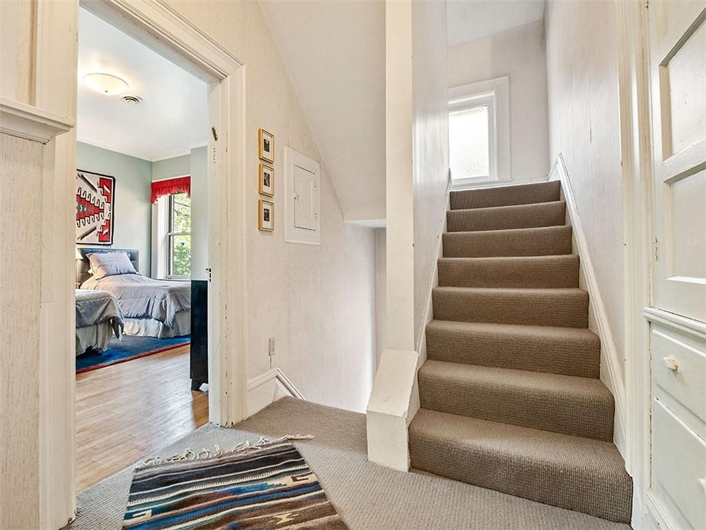 6417 Darlington Road Pittsburgh, PA 15217 - Photo 32 of 40 a living room with furniture and a rug