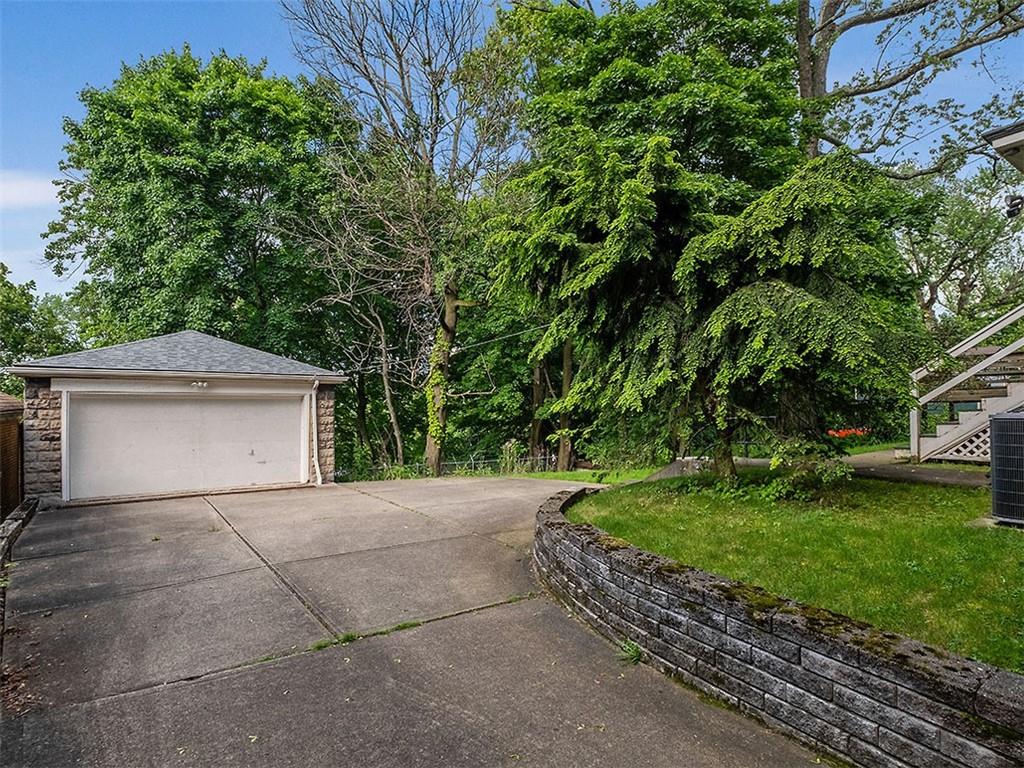 6417 Darlington Road Pittsburgh, PA 15217 - Photo 37 of 40 a front view of a house with a yard