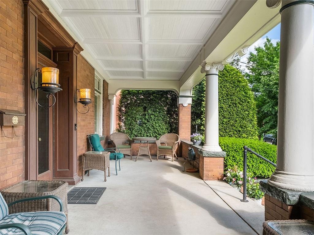 6417 Darlington Road Pittsburgh, PA 15217 - Photo 4 of 40 a building outdoor space with patio furniture and potted plants