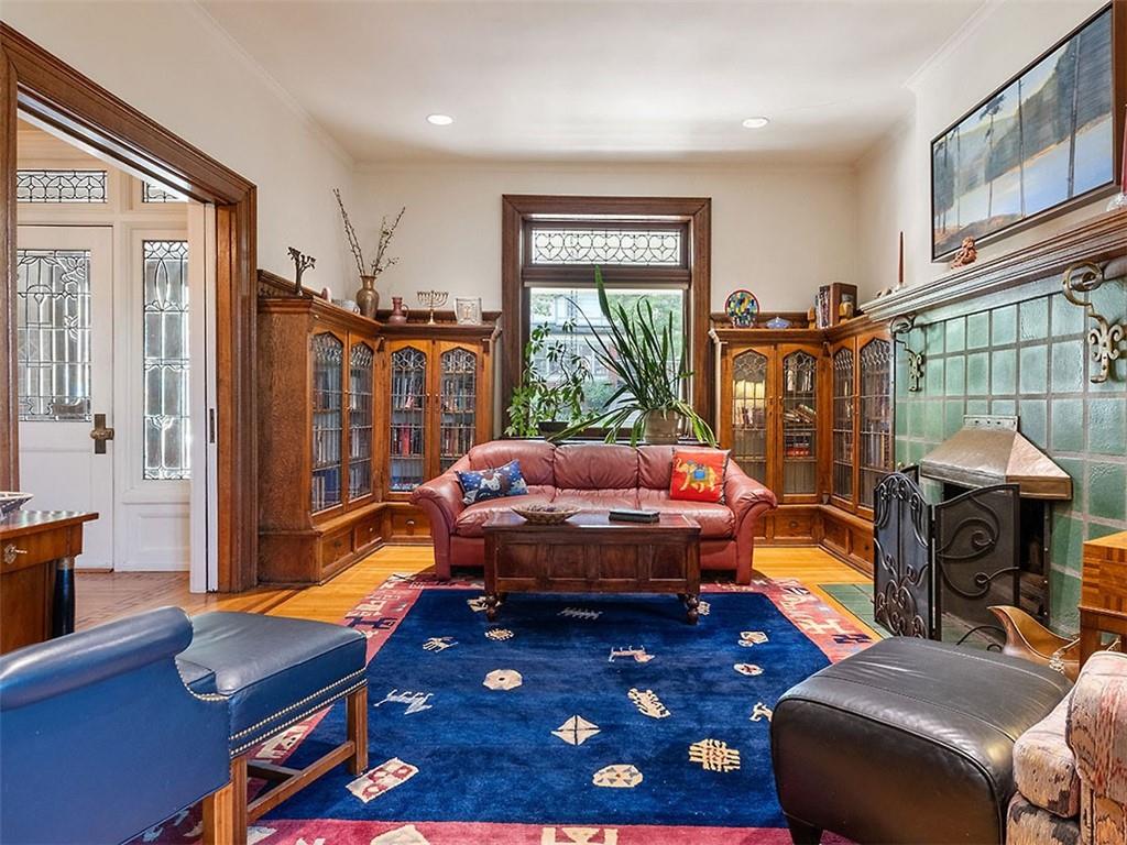 6417 Darlington Road Pittsburgh, PA 15217 - Photo 10 of 40 a bedroom with furniture and a window