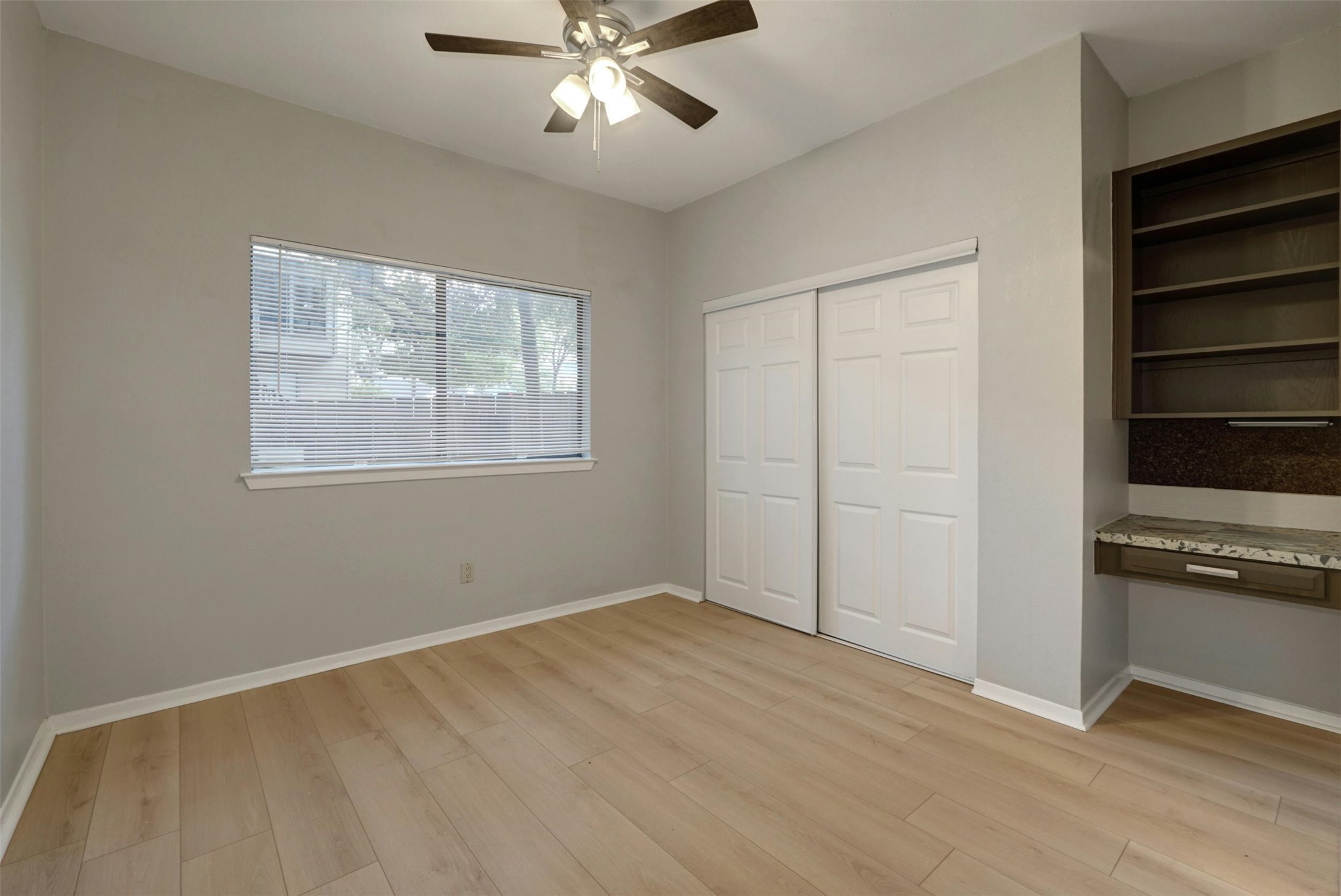 908 Poplar Street, Unit 103 Austin, TX 78705 - Photo 14 of 16 a view of an empty room with a window