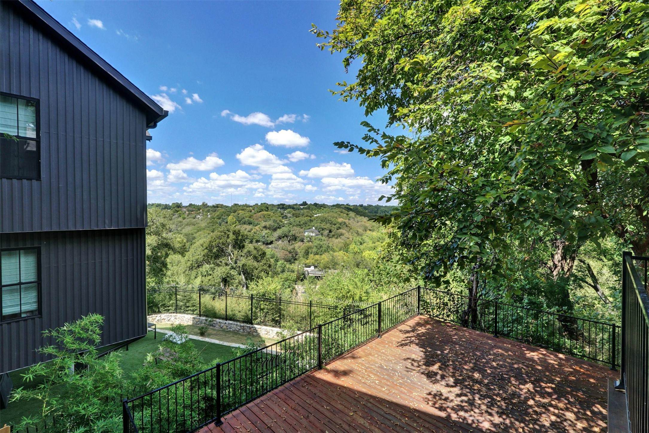 908 Poplar Street, Unit 103 Austin, TX 78705 - Photo 16 of 16 a view of a backyard with plants