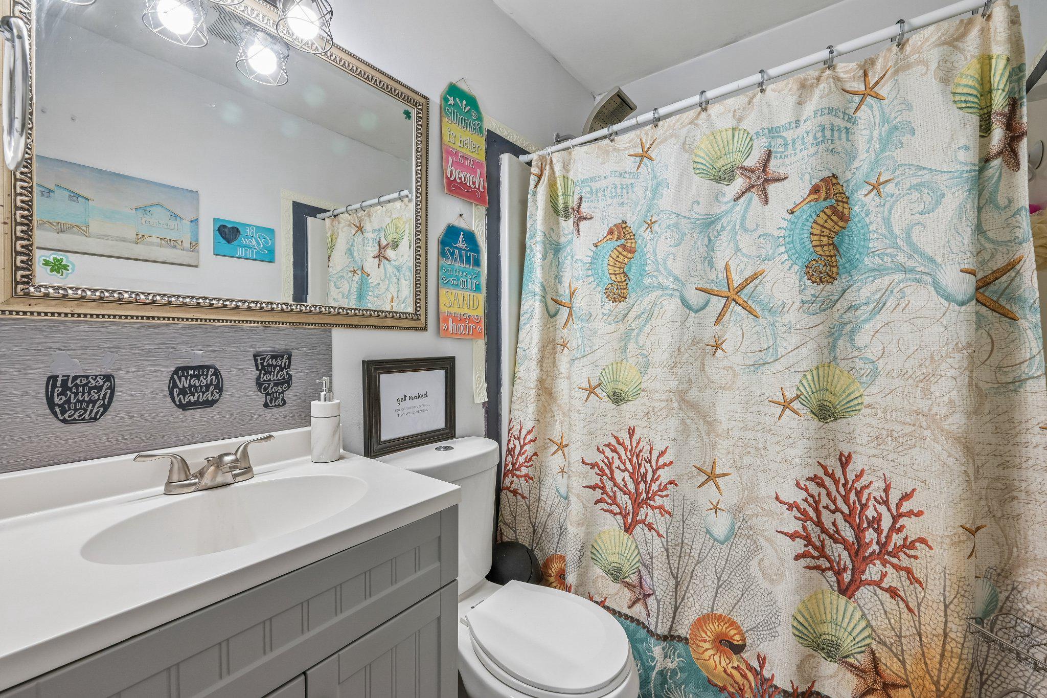 603 New Jersey Road Browns Mills, NJ 08015 - Photo 20 of 28 Coastal charm in a serene bathroom.