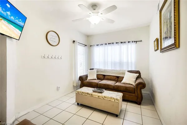 a living room with furniture and a window