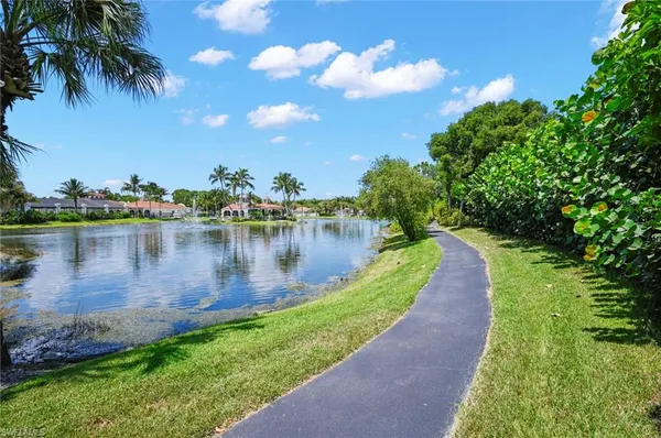 a view of a lake with a big yard