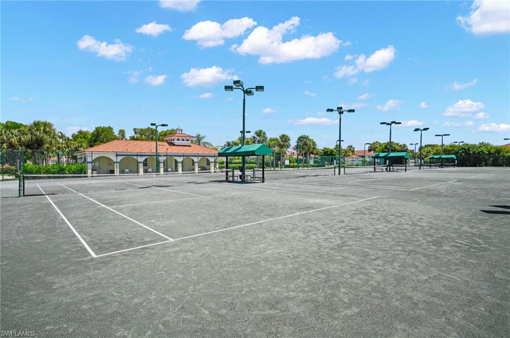 23810 Marbella Bay Road, Unit 103 Estero, FL 34135 - Photo 27 of 32 a view of a tennis court