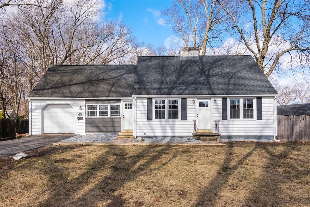 48 Beeler Avenue Chicopee, MA 01020 - Photo 1 of 30 a front view of a house with a yard